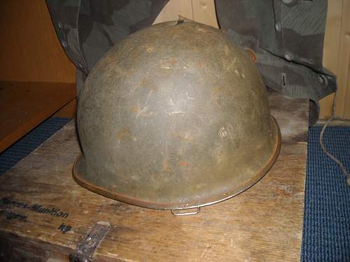 My M1 helmet with a bit of history...