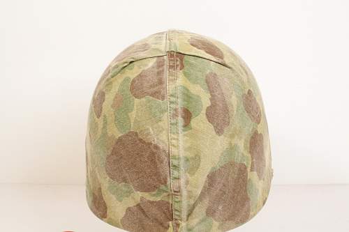 WWII M1 helmet w/ USMC cover.