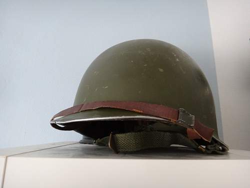 What’s on with the paint on this M1 helmet?