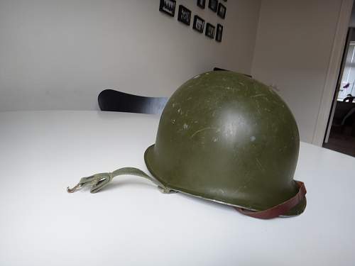 What’s on with the paint on this M1 helmet?