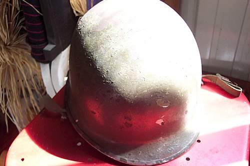 Can someone identify this chinstrap on my ww2 m1 helmet ??