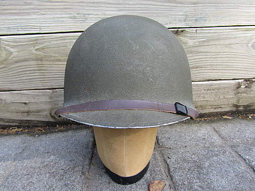 Can someone identify this chinstrap on my ww2 m1 helmet ??