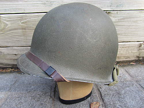 Can someone identify this chinstrap on my ww2 m1 helmet ??