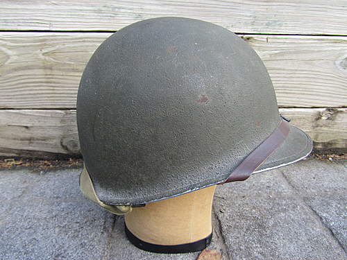 Can someone identify this chinstrap on my ww2 m1 helmet ??