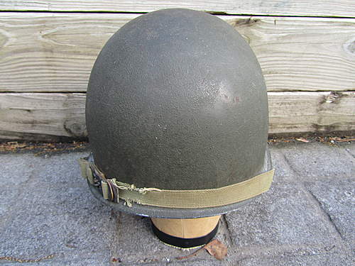 Can someone identify this chinstrap on my ww2 m1 helmet ??