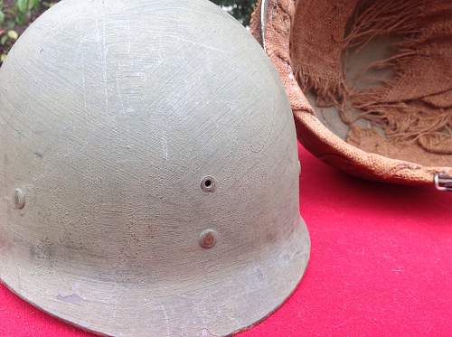 Possible Korean burlap War m1 helmet