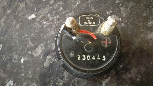 1944 dated crows foot marked bakelite bezel gauge??