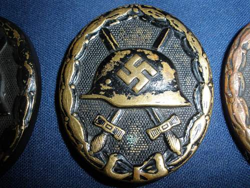 3 black wound badges