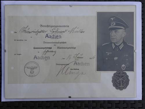 verwundentenabzeichen marine 1936 with paper and picture