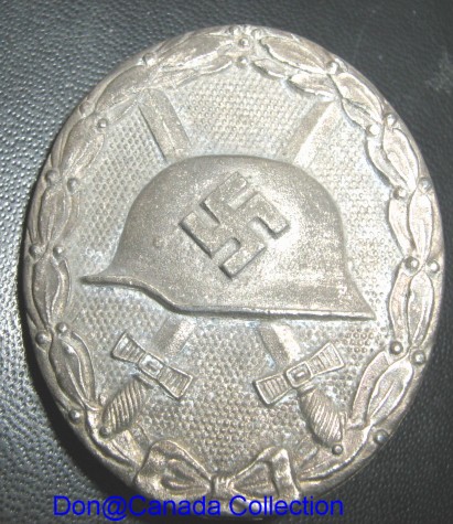 Silver l/12 wound badge???????