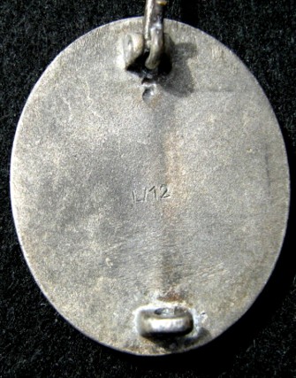 Silver l/12 wound badge???????