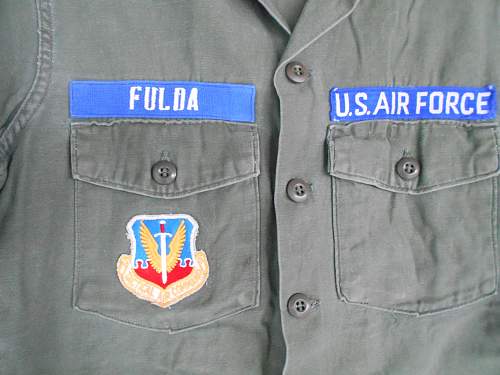 Two USAF Airman's shirts, and another