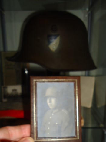 Infantry Regiment 6: M18 Helmet and photo album.