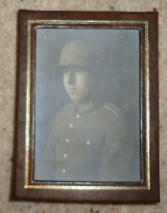 Infantry Regiment 6: M18 Helmet and photo album.