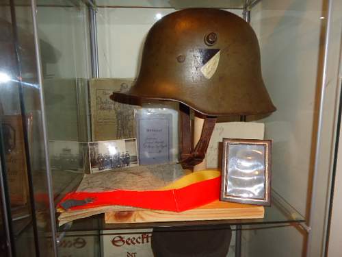 Infantry Regiment 6: M18 Helmet and photo album.