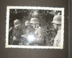 Infantry Regiment 6: M18 Helmet and photo album.