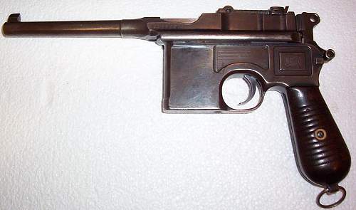My Mauser C/96 &quot;Broomhandle&quot; 7.63mm Pistol. Atypically for me, not mint , but still really clean.