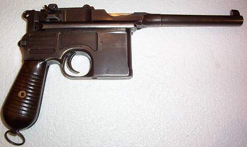 My Mauser C/96 &quot;Broomhandle&quot; 7.63mm Pistol. Atypically for me, not mint , but still really clean.