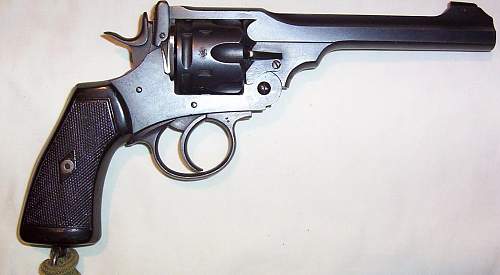 A nice 1917 dated, Webley Mark VI, top break revolver, but with turned down cylinder. Boo Hoo!