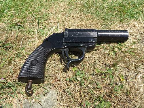 Flare pistol found in a coal bunker.