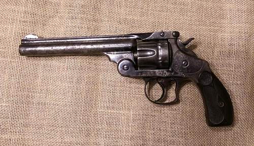 WW2 1911, plus spainish American war revolver?