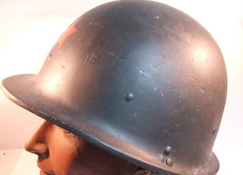 unusual fiber type helmet with red star?