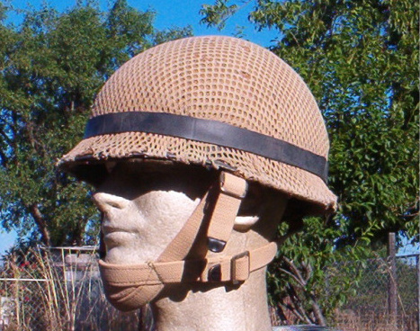 Lebanese soldier wearing the Israeli style M1 helmet with 3 point para straps 1982