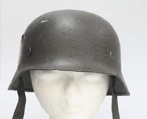 Why do WW2 Finnish helmets often look like this