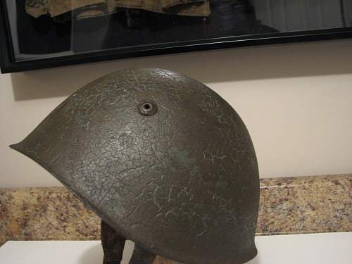 WW2 Italian helmet or pre war?