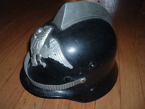 Assorted reissue Polish Fire Helmets