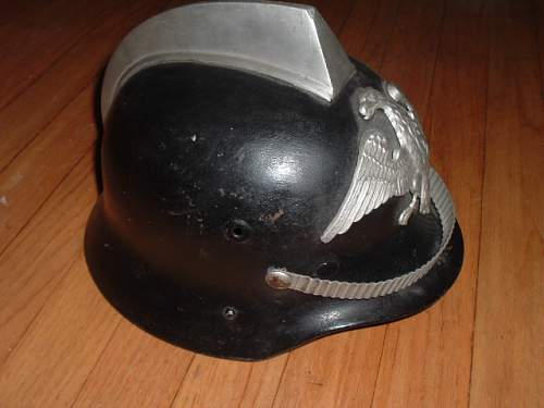 Assorted reissue Polish Fire Helmets