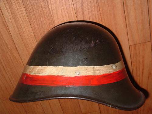 Assorted reissue Polish Fire Helmets