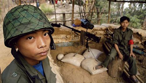 Burmese soldier wearing a Chinese made helmet