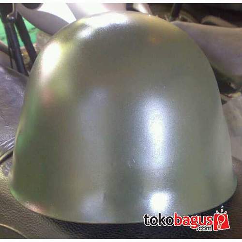 German steel helmet lookalike? Need help to identify the helmet