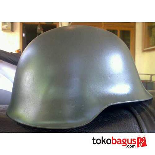German steel helmet lookalike? Need help to identify the helmet