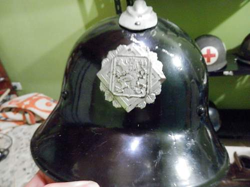 What is the history of this Czech helmet? And is it military or civilian use?