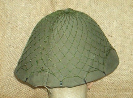 WWII US M43 hood used to make helmet covers on East German M56