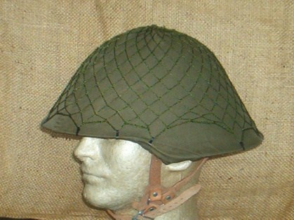 WWII US M43 hood used to make helmet covers on East German M56