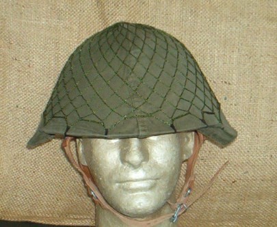 WWII US M43 hood used to make helmet covers on East German M56