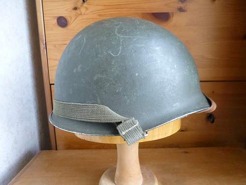 Two Belgian M51 Helmets