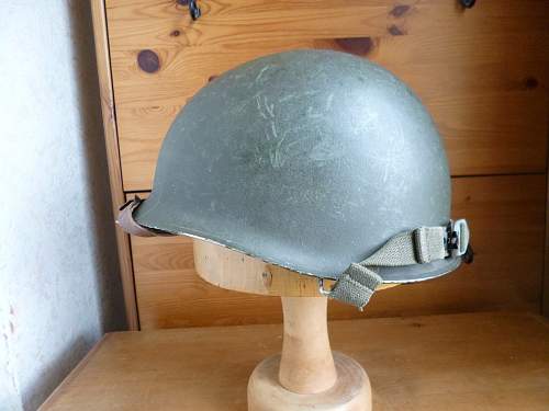 Two Belgian M51 Helmets