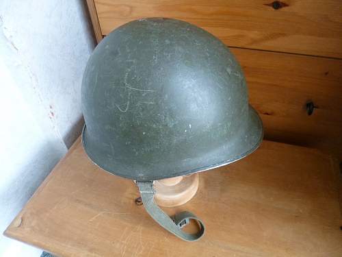 Two Belgian M51 Helmets