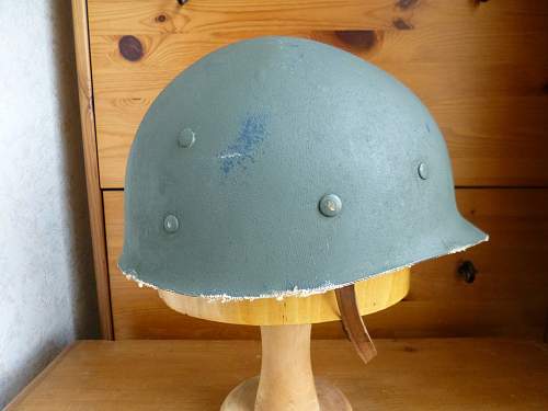 Two Belgian M51 Helmets