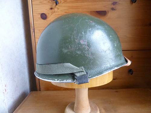 Two Belgian M51 Helmets