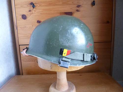 Two Belgian M51 Helmets