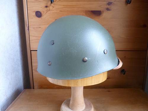 Two Belgian M51 Helmets