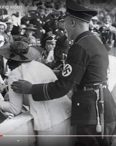 Hitler gets kissed by an American woman at 1936 Olympics