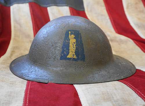 2 Flashed US Brodie M1917 Helmets