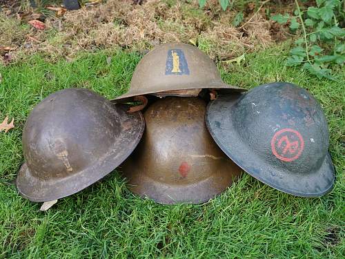 2 Flashed US Brodie M1917 Helmets