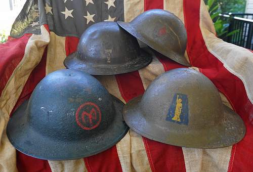 2 Flashed US Brodie M1917 Helmets